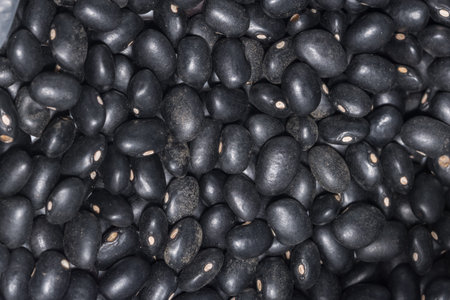 Black beans, white background.
