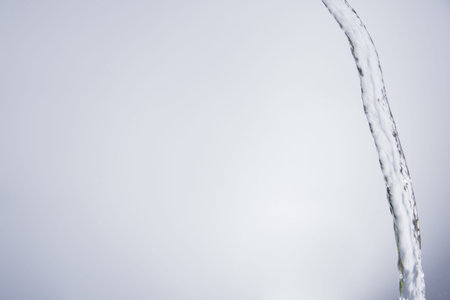 Water splashing on white background