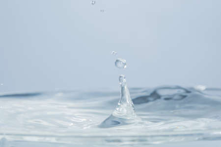 Waves and water dropsの写真素材