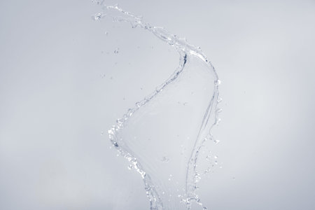 Water splashing on white backgroundの写真素材