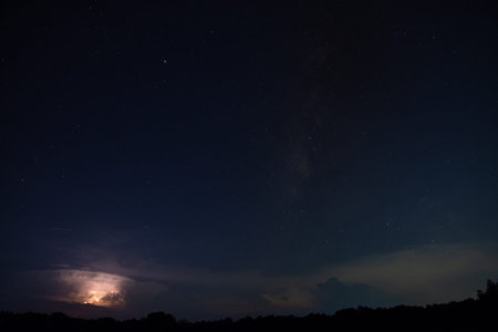 Milkyway and Lightning Sky at nightの写真素材