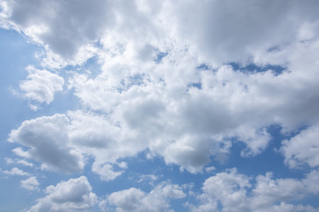 Sun, blue sky and clouds.