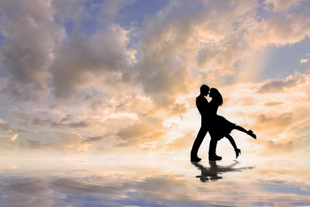 Siluette lovers with sky reflecting water