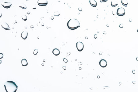 Water droplets on a white background