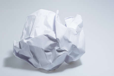 White Paper White crumpled into a ballの写真素材