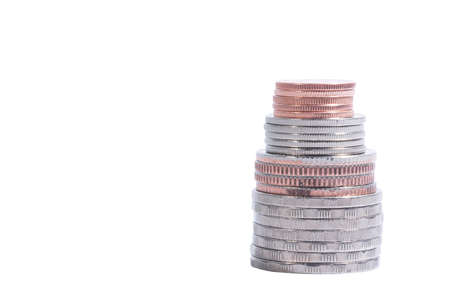 Stacked coins isolated on white background Business and finance conceptの写真素材