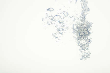 The Bubbles in the water white backgroundの写真素材
