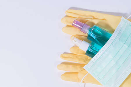 Latex gloves, gel masks, alcohol, protective coronavirus or covid 19の写真素材