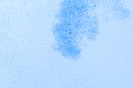 Light blue bubbles and water White backgroundの写真素材