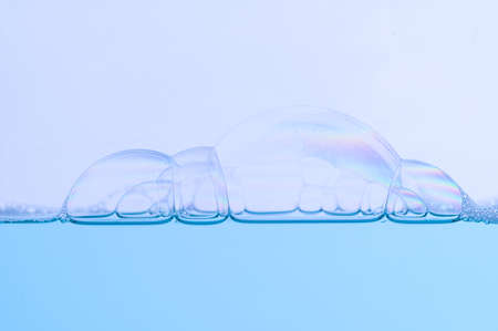 Light blue bubbles and water White backgroundの写真素材