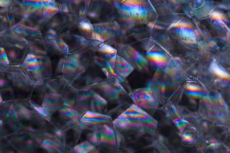 Rainbow in a black background bubbleの写真素材