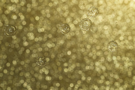 Abstract background golden bokeh roundの写真素材
