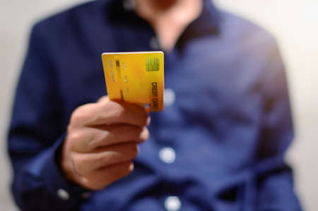 Business people use credit cards to buy, sell, shop, do businessの写真素材