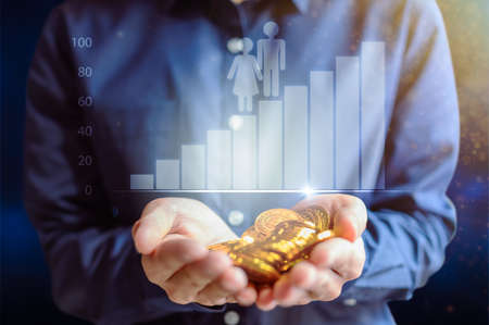 Business people display graphs for trading money around the worldの写真素材