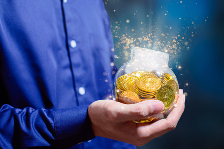 The idea of businessmen holding money, making profits, saving money.の写真素材