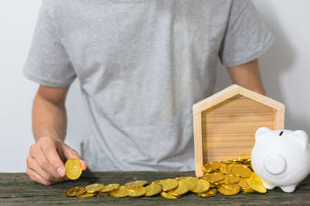 The concept of a businessman growing up to save moneyの写真素材