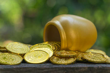 Saving money concept and save money to support everything in life with sun light bokeh backgroundの写真素材