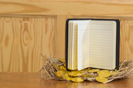 The idea of making money, collecting money is placed on a straw.の写真素材