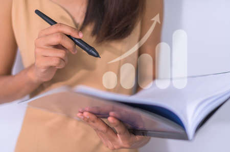 Business people display graph In business growthの写真素材