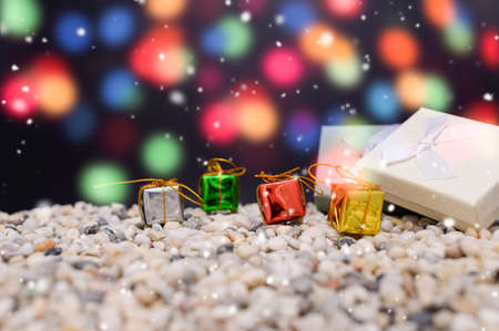 Merry christmas gift box snowy night backgroundの写真素材