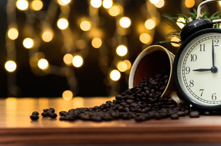 Coffee beans Placed on the desk Orange bokeh floor scene