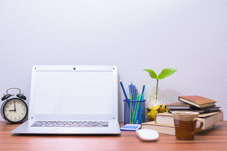 concept of computers in business earns money at the desk