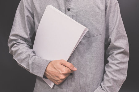 Business people hold documents in workの写真素材