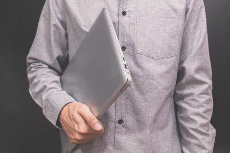 A business man with a laptop computerの写真素材