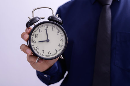 A person holding a watchの写真素材