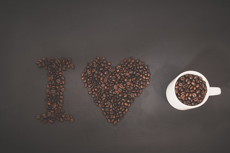 Love drinking coffee, Coffee beans line up the word coffeeの写真素材