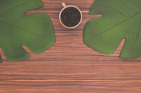 The coffee mug is on the deskの写真素材