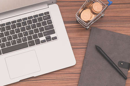 Notebook computers and books are on the desk.の写真素材