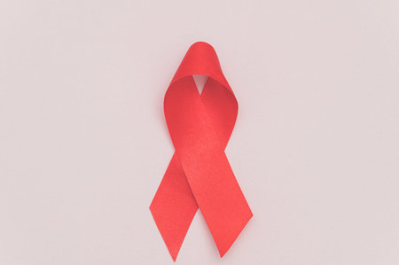 Red ribbon symbolizes world health day