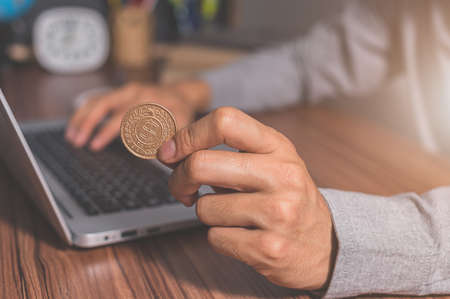 Using a computer to make money onlineの写真素材