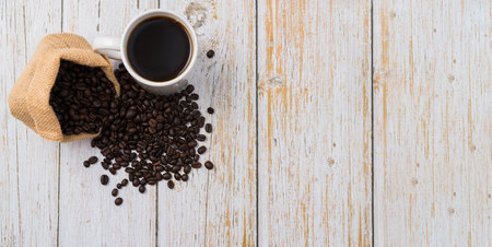 Love drinking coffee, coffee mugs and coffee beans on the table