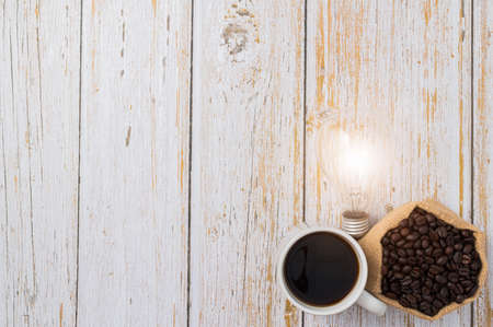 Love drinking coffee, Coffee cup light bulb emitting energyの写真素材