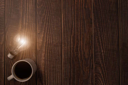 Love drinking coffee, Coffee cup light bulb emitting energyの写真素材