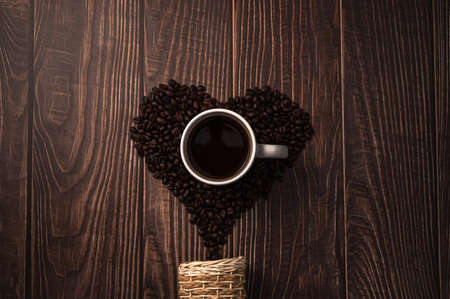 Coffee beans arranged in a heart shape.Love drinking coffeeの写真素材