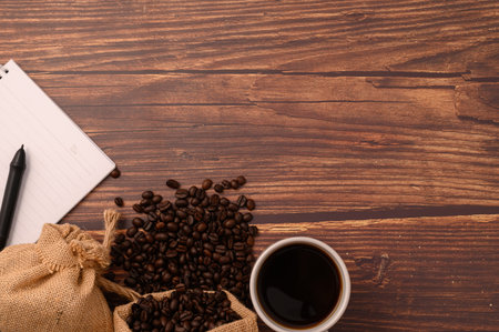 Coffee and a notebook are at your desk.