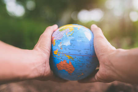 World Environment Day .Love the world .Hand holding a globeの写真素材
