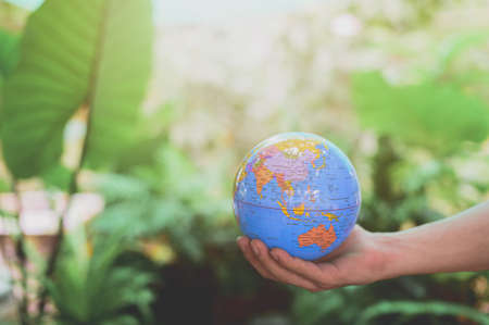 World Environment Day .Love the world .Hand holding a globeの写真素材