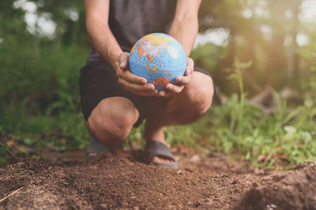 World Environment Day .Love the world .Hand holding a globeの写真素材