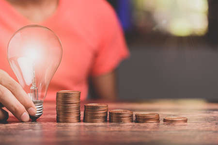 light bulb And there is a gear icon Investment and business growth stockの写真素材