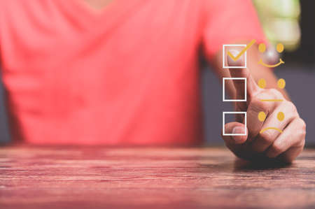 Customer service and Satisfaction concept ,Business people are touching the virtual screenの写真素材