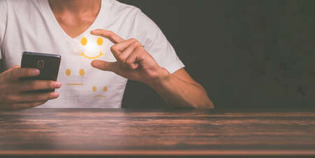 The customer tick symbol was given the satisfaction of employeesの写真素材