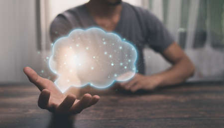 Holding hands, brain icon showing ideas, searching for ideas in work.illustrationの写真素材