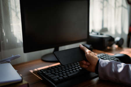 businessman using smartphone at workの写真素材