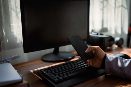 businessman using smartphone at workの写真素材