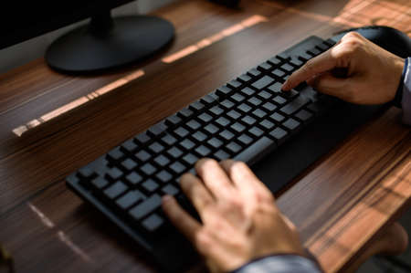 business man use a computer at workの写真素材