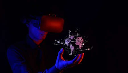 glasses of virtual reality. Augmented reality, game, future technology concept. VR simulated world of metaverse body posture futuristic dressの写真素材